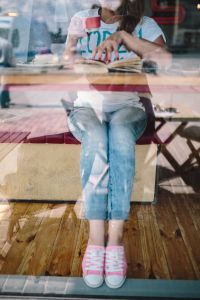 Woman Reading in a Coffee Shop – Cozy Book and Coffee Lifestyle Photos