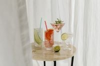 Kaboompics - Colorful Cocktails on a Round Table by the Window