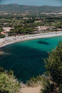 Kaboompics - Panoramic Beach with Hillside Village and Clear Water