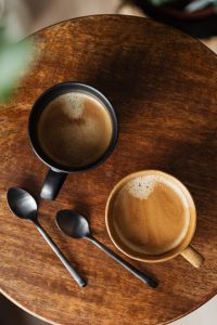 Kaboompics - Dark Espresso Cup on Rustic Wooden Table with Copy Space