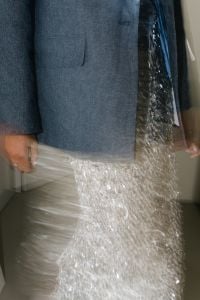 Kaboompics - Flash Photography Aesthetic of Woman in Blue Shirt and Silver Skirt