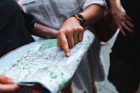 Kaboompics - Group of people examining a map