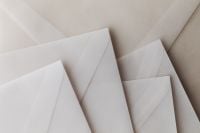 Kaboompics - Envelope Stack Mockup Clean Composition