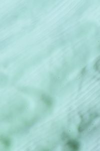 Kaboompics - Pale Mint Blue Skincare Cream Streaks, Soft Abstract Macro Texture Background