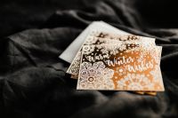 Kaboompics - Christmas Greeting Cards on Soft Black Fabric