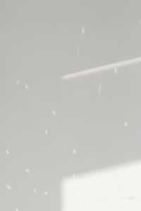 Kaboompics - Minimal White Wall with Diagonal Light and Shadow