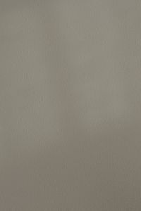 Kaboompics - Pale Gray Concrete Wall with Fine Pebbled Grain