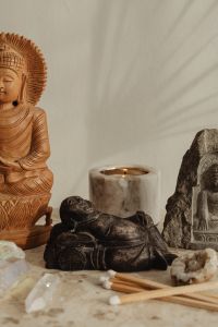 Kaboompics - Wide Buddha Altar With Crystals And Candle