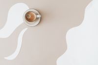 Kaboompics - Minimal Beige Coffee Cup on Curved Neutral Background with Copy Space