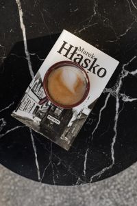 Coffee and book on table