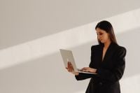 Kaboompics - Businesswoman Working on a Laptop in a Minimalist Interior