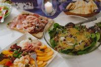 Kaboompics - Catering banquet table with different food snacks and appetizers