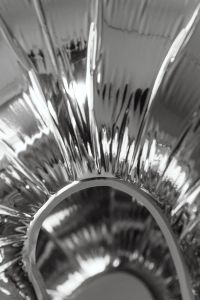 Kaboompics - Abstract Ribbed Chrome Surface Macro