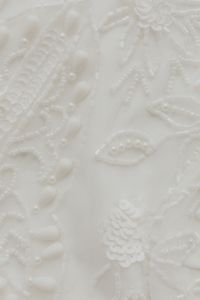 Kaboompics - White Beaded Mesh Fabric With Sequin Pattern