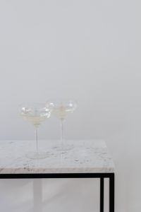 Kaboompics - Minimal Champagne Glasses on Marble With Copy Space