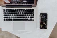 Kaboompics - Flat Lay Laptop and Smartphone on White Marble Desk