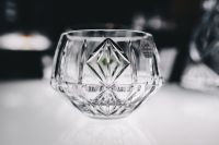 Kaboompics - Geometric Cut Crystal Vessel on White Display Table