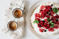 Kaboompics - Overhead Coffee and Pavlova with Two Espresso Cups on Checked Linen