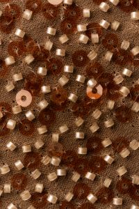 Kaboompics - Copper Sequin Fabric Macro