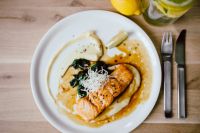Kaboompics - Wood Table Salmon Dinner with Lemon, Lime Drink and Stainless Steel Fork and Knife