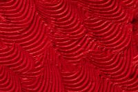 Kaboompics - Bright Red Lipstick Texture with Curved Brushstrokes