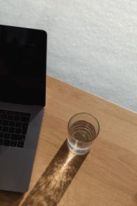 Kaboompics - Laptop on Wood Desk with Light Neutral Background Copy Space