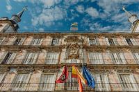 Kaboompics - Plaza Mayor Facade with Spanish and European Flags