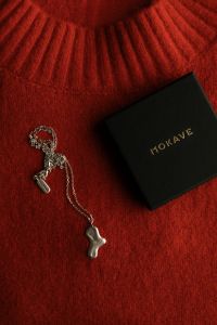 Kaboompics - Silver Necklace and Black Gift Box on Burgundy Fabric