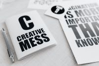 Kaboompics - Close-Up of Typography Notebook and Motivational Cards