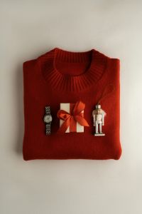 Kaboompics - Folded Burgundy Sweater with Christmas Gift and Accessories