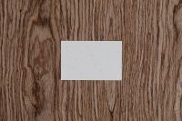 Kaboompics - Horizontal Blank Business Card on Natural Wood Grain, Overhead Minimal Branding Mockup