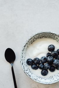 Kaboompics - Yogurt Bowl with Blueberries and Black Spoon