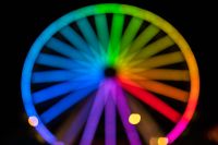 Kaboompics - Colorful Ferris Wheel at Night Against a Black Background