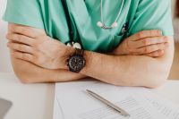 Kaboompics - Doctor With Crossed Arms in Office