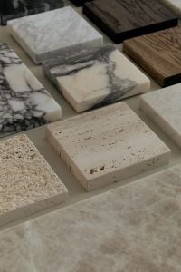 Kaboompics - White Marble, Black Stone and Wood Material Samples on Beige Background