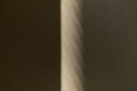 Kaboompics - Warm Minimal Background with Sunlit Wall and Deep Shadow