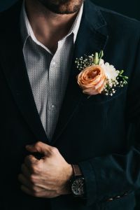 Kaboompics - A man in a suit with flowers in a Boutonnière