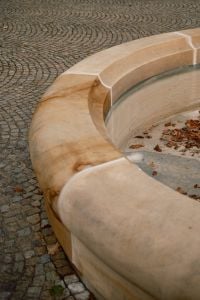 Kaboompics - Stone Fountain Detail With Autumn Leaves And Cobblestone