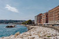 Kaboompics - Rocky Naples Waterfront Promenade With Colorful Seaside Buildings