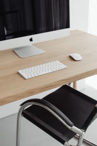 Kaboompics - Vertical Modern Computer Workstation with White Keyboard and Chrome Chair