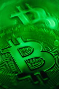 Kaboompics - Bitcoin Coin in Green Light
