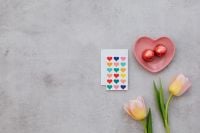 Kaboompics - Valentine Flatlay With Tulips, Love Note, Heart Dish, and Sweets