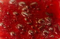 Kaboompics - Red Skincare Liquid Texture