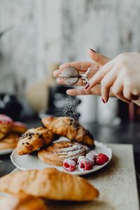 Kaboompics - Raspberry Pastry Breakfast with a Sugar Sieve