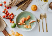 Kaboompics - Citrus, Cherry Tomatoes and Bread on a White Table