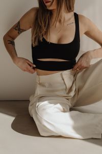 Kaboompics - Black Crop Top and White Trousers Casual Outfit