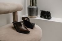 Kaboompics - Brown Leather Shoes on Stool with Black Handbag