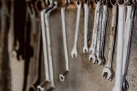 Kaboompics - Close Detail of Wrenches Hanging from a Workshop Rail