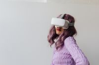 Kaboompics - Woman Wearing a VR Headset and Purple Top