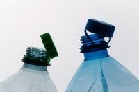 Kaboompics - Open Plastic Bottles With Caps Recycling Concept